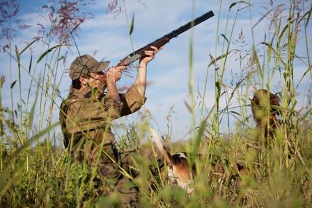 Hunter with hunting dog during a hunt